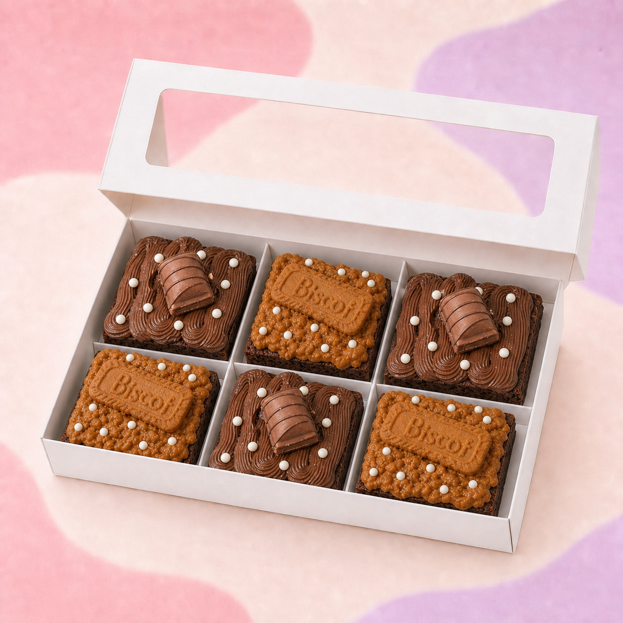 Open white box with six BrowniBop Nutella and Cookie Butter brownies